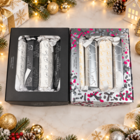 Maßgefertigte Silberne Weihnachtsknallboxen mit Prägung, Schaumstoffeinlage, Kleinen Spielzeugen, Knallern, Geschenken, Witzen und Bändern