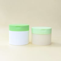 Pot de luxe 300 ml en plastique PP vide haut de gamme avec couvercle à clapet pour tampons de toner, crème visage et gommage corporel