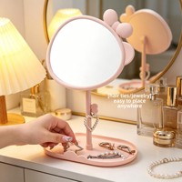 Miroir de maquillage de bureau rotatif en plastique à simple face avec grossissement 1x, idéal pour les étudiants en résidence universitaire, avec un design nœud papillon style princesse