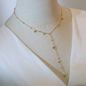 Collar de cadena tipo lariat en forma de Y de moda, chapado en oro de 18 quilates, de acero inoxidable, con colgante de bola delicado y borla larga, para mujer, ideal para fiestas y vestidos. - Product Image 6