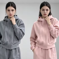 Ensemble de survêtement pour femmes européennes, couleur unie, sweat à capuche et pantalon plissé sur le côté, 2 pièces assorties