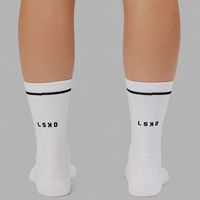 Calcetines populares para correr personalizados con colores Calcetines de ciclismo con logotipo personalizado Calcetín de equipo de calidad de nailon