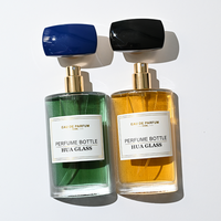 Flacon de parfum élégant et luxueux en verre plat incurvé de 50 ml avec bouchon poli bicolore