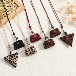 กระเป๋าใส่เหรียญหนังลายเสือดาวขนาดเล็กน่ารัก พร้อมสายคล้องคอแบบยาวสำหรับใส่เสื้อสเวตเตอร์ ใช้เป็นกระเป๋าเก็บของได้ - Product Image 1