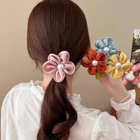 Nouveau haut de gamme en plastique fleur téléphone cordon cheveux cravate doux été atmosphère femmes queue de cheval bandeau cheveux tressage artefact