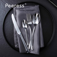 L'ensemble de vaisselle moderne en acier inoxydable de 4 pièces peut être réutilisé pour les fourchettes à manger, les couteaux, les cuillères, la vaisselle pour le dîner et la fête