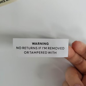 Étiquettes d'avertissement autocollantes rondes en rouleau de papier anti-contrefaçon pour emballages professionnels - Product Image 2