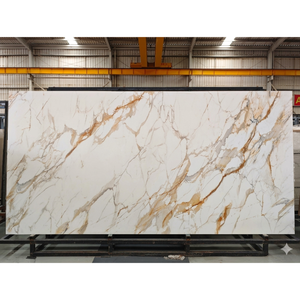 Plaques murales en pierre frittée Calacatta Gold <span class=keywords><strong>de</strong></span> haute qualité <span class=keywords><strong>pour</strong></span> <span class=keywords><strong>salle</strong></span> <span class=keywords><strong>de</strong></span> <span class=keywords><strong>bain</strong></span>, comptoirs <span class=keywords><strong>de</strong></span> cuisine ou carrelage mural - Product Image 1
