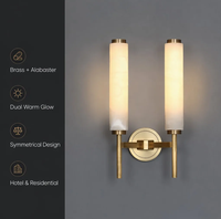 Applique murale LED haut de gamme en pierre naturelle à double tête, finition cuivre massif, style nordique cylindrique en albâtre pour villa