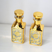 Flacons d'affichage de parfum de décantation fantaisie personnalisés de 150ml carafe d'huile de parfum en or
