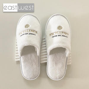 Pantofole <span class=keywords><strong>Spa</strong></span> dal Design unico est-ovest pantofole in pile di corallo bianco con Logo privato pantofola personalizzata usa e getta da Hotel - Product Image 1