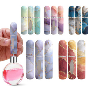Nouveau design – Flacon de parfum de luxe rechargeable en plastique de 5 ml – Flacon pulvérisateur vide de 5 ml à remplissage par le bas – Atomiseur de parfum - Product Image 1