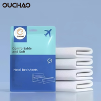 Draps, taies d'oreiller et housses de couette jetables pour les voyages d'affaires en solo