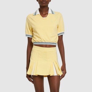 Jupes de golf et de tennis respirantes à col en V pour femmes, plissées à la moitié, avec perforations, fabrication OEM/ODM en gros - Product Image 1