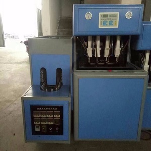 LT-S4-2L <span class=keywords><strong>de</strong></span> moulage par étirage-soufflage semi-automatique <span class=keywords><strong>de</strong></span> bouteilles en plastique PET à 4 cavités <span class=keywords><strong>de</strong></span> haute qualité - Product Image 5