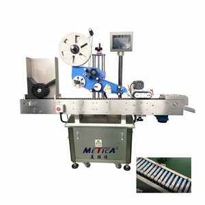 Máquina Etiquetadora Horizontal para <span class=keywords><strong>Bálsamo</strong></span> Labial METICA, Jeringas, Conos de Papel Pre-enrollados, Tubos de Vidrio, Lápiz Labial, Esmalte de Uñas, Frascos de Cosméticos - Product Image 1