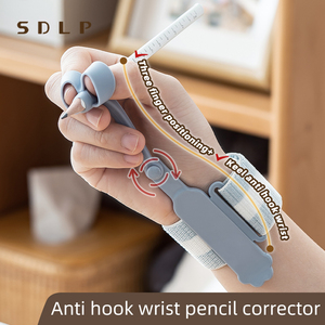 OEM/ODM Stylo pour enfants Poignée d'aide à l'écriture Positionnement à trois doigts Anti-crochet Bracelet Silicone Poignée de crayon - Product Image 2