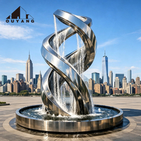 Sculpture abstraite en acier inoxydable sur mesure, grande taille, en forme de ruban, art métallique moderne pour l'aménagement paysager extérieur, statue pour parc, place publique, jardin