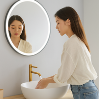 Miroir de courtoisie de salle de bain rond à éclairage frontal à LED de style hôtel de luxe avec anneau lumineux de couleur réglable et fonction anti-buée