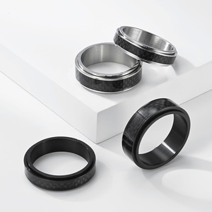 Unisex <b>titanium</b> steel and carbon fiber inlaid rotating <b>ring</b>, street style, niche and high-end, couple <b>rings</b>. - Product Image 2