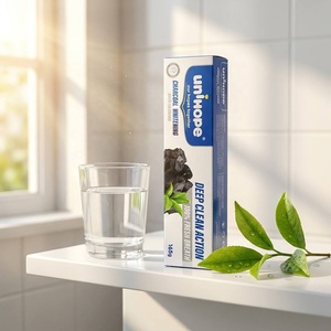 Dentifrice blanchissant au <span class=keywords><strong>charbon</strong></span> Unihope 165g, essence de thé vert, <span class=keywords><strong>action</strong></span> nettoyante en profondeur, haleine fraîche, soins dentaires, vente en gros - Product Image 1