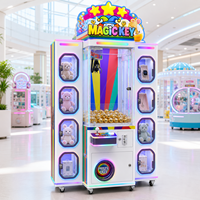 Juego de Premios con Desbloqueo por Llave, con Arena Central de Garras y Ocho Casilleros Laterales para Electrónicos, Juguetes de Peluche, Cajas Sorpresa y Colgantes