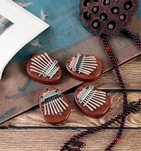 Fabrika toptan Kalimba enstrüman başparmak piyano ahşap akrilik Kalimba anahtarlık 8 tuşları Mini Kalimba enstrüman