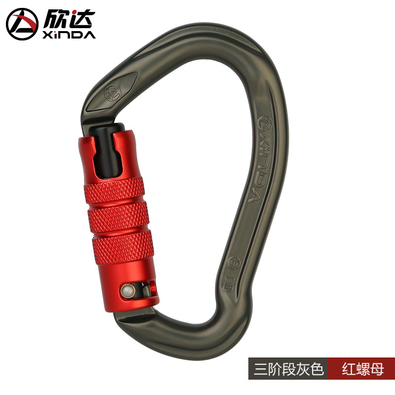 Noix automatiques grises et rouges