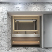 Meuble-lavabo mural flottant en acrylique massif sur mesure avec vasque intégrée et miroir LED pour villa