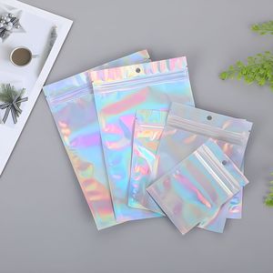 <span class=keywords><strong>Sac</strong></span> en <span class=keywords><strong>plastique</strong></span> <span class=keywords><strong>transparent</strong></span> holographique réutilisable à fermeture éclair plate, scellé sur 3 côtés, personnalisé, pour emballage de mini-sacs cosmétiques laser – Vente chaude - Product Image 1