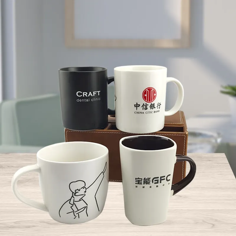 Modernqiu شخصية الخزف الترويجية شعار مخصص بسعر الجملة السيراميك القدح الأبيض كوب (مج) للقهوة بصورة مطبوعة