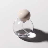 Capuchon en forme de galet Luxe en stock Flacon de parfum en verre irrégulier de 30ml en forme de goutte