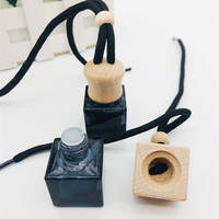 Vente en gros de 8ml diffuseur de désodorisant vide givré noir bouteille de parfum suspendue pour voiture avec bouchon en bois