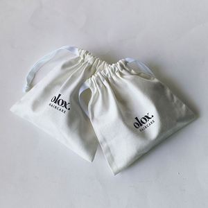 Wholesale Cheap Natural Color Cotton Dust <b>Pouch</b> Canvas Fabric <b>Drawstring</b> Bag With Logo - Product Image 1