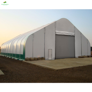 Abri d'auto moderne extérieur en acier PVC Auvent de garage en <span class=keywords><strong>bois</strong></span> traité thermiquement Poly motos Hangar de bâtiment de stockage de foin entrepôt en métal - Product Image 1