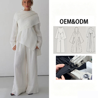 Ensemble deux pièces OEM uni et sobre pour femme musulmane, avec haut asymétrique à manches évasées et pantalon large, tenue quotidienne