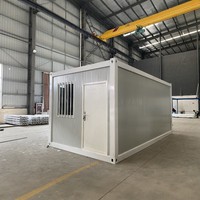 Maison conteneur préfabriquée résistante aux intempéries, à structure modulaire en acier, avec aménagement personnalisable, type hôtel ou villa