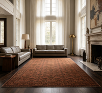 Un tapis brun vintage à motif floral oriental, un tapis traditionnel à bordures, adapté au salon