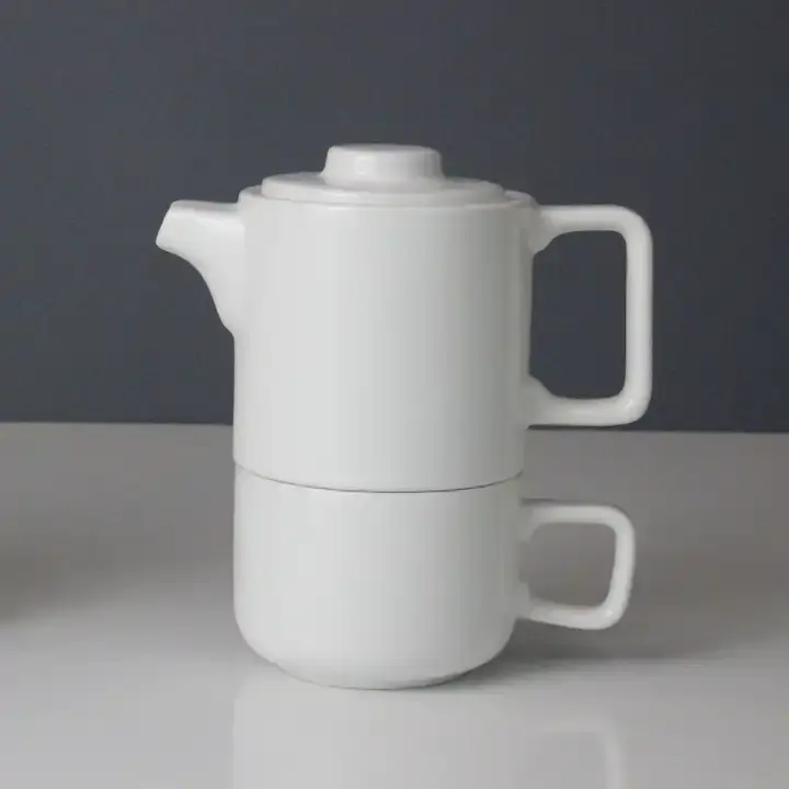 Service à thé en céramique pour une théière avec conception d'empilage d'infuseur en acier inoxydable de tasse de thé Logo de couleur personnalisé très bienvenu