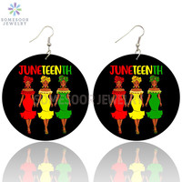 Boucles d'oreilles inspirantes en bois avec motif double face imprimé de style africain rond