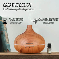 Diffuseur d'aromathérapie à ultrasons en grain de bois télécommandé avec 7 couleurs de lumière Humidificateur d'aromathérapie 500ml Grand volume de brume