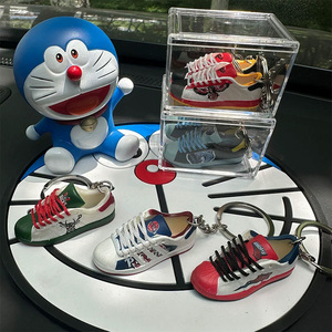 Porte-clés en PVC OEM/ODM, motif <span class=keywords><strong>chaussure</strong></span>, série équipes <span class=keywords><strong>NBA</strong></span>, pendentif <span class=keywords><strong>chaussure</strong></span> de sport, Lakers Celtics, cadeau moderne et minimaliste - Product Image 1