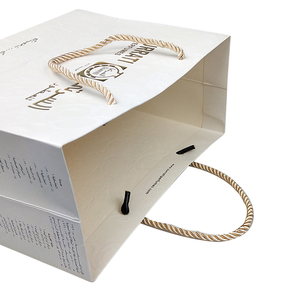 Sophisticated <b>Ivory</b> White Paper Gift <b>Bags</b> with Gold Foil Accents for Luxury Retail Packaging and High End Gift Presentation - Product Image 4