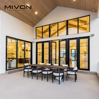 Porte battante double moderne en aluminium et verre, style américain et français, insonorisée et isolante, avec décoration