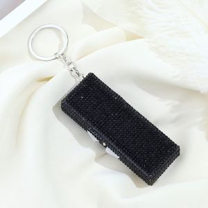 Vente en gros de boîtes à pilules en métal portables de petite taille avec strass et diamants, porte-clés brillant - Product Image 3