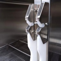 Cage d'élevage pour chiens et chats en acier inoxydable à 4 portes - Design moderne de luxe, pieds antidérapants, motif solide, écologique et grand espace intérieur