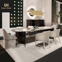 Table à manger longue personnalisable avec plateau en marbre moderne et pieds en acier inoxydable pour villa et hôtel