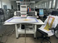 Machine à broder informatisée best-seller vitesse 1200 tr/min état neuf usage domestique pour la broderie de styles Agbada