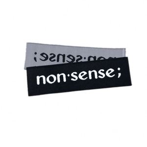 Étiquettes tissées personnalisées avec logo blanc, étiquettes tissées coupées à la règle pour vêtements - Product Image 3