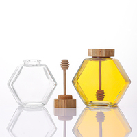 Pot de miel en verre hexagonal Transparent de haute qualité 100ml 220ml 380ml capacité en gros pour usage alimentaire louche en bois bambou liège
